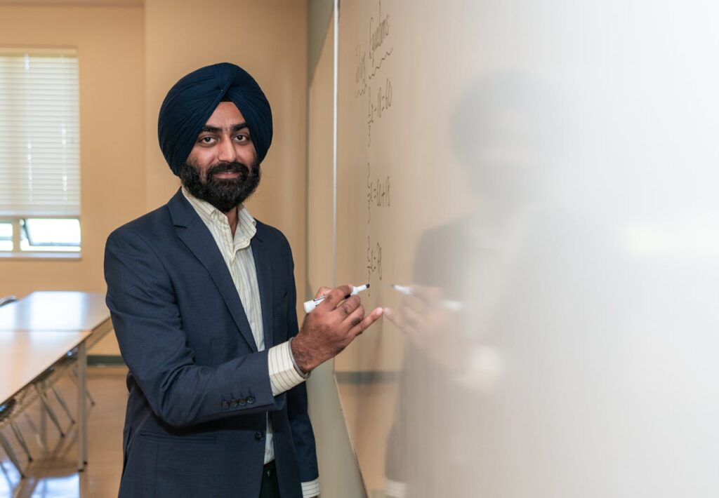 Portrait of a Teacher Writing on a Whiteboard